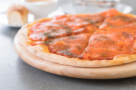 smoked salmon pizza with baked spinach andlobster soupの写真素材