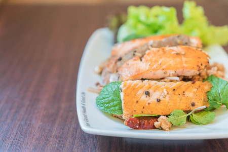 Spicy salmon sald. Thai style salad.の写真素材