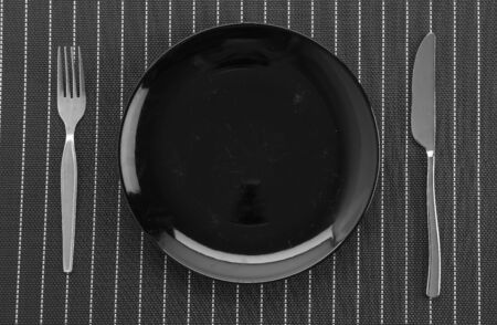 plate mat with plate fork and knifeの写真素材