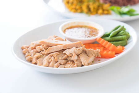 grilled pork and vegetable with spicy sauceの写真素材