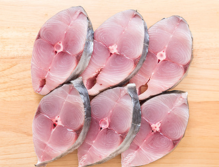 Fresh Mackerel Steak on wood boardの写真素材
