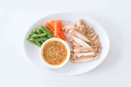 grilled pork and vegetable with spicy sauceの写真素材