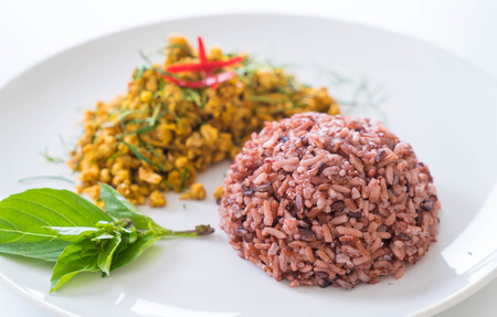 Stir Fried Minced Pork with Hot Yellow Curry and berry riceの写真素材