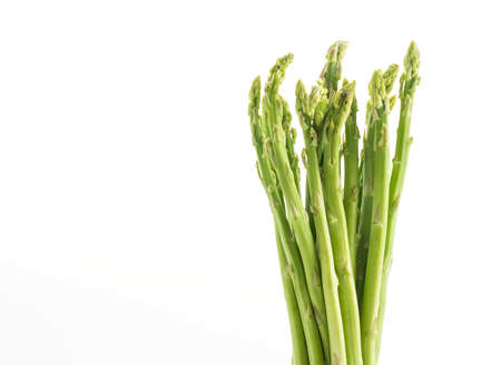 fresh asparagus on white backgroundの写真素材