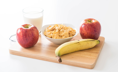 milk, apple, banana and cornflakes for breakfast