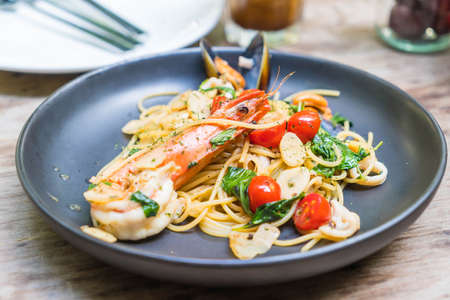 stir-fried spaghetti seafood in restaurant