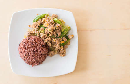 stir-fried cucumber, egg and mince with berry rice - healthy foodの写真素材