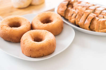 donut on white plateの写真素材