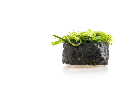 spicy seaweed salad sushi on white backgroundの写真素材