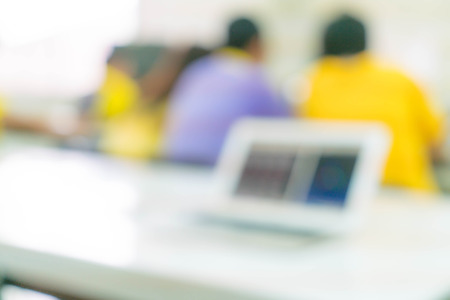 abstract blur people study or lecture or meeting or do workshop in classroom with notebookの写真素材