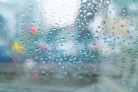 rain drops on car glass - bue white balance processing style