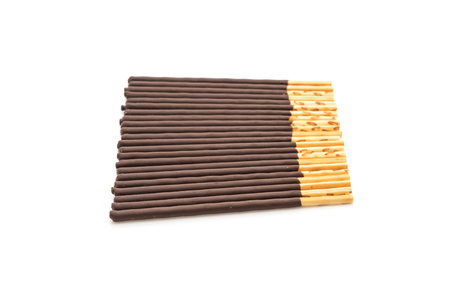 biscuit stick with chocolate flavored on white backgroundの写真素材