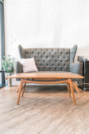 Pillow and Sofa decoration in luxury livingroom interior - vintage filter effectの写真素材