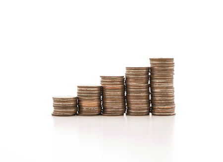 Coin stacks on a white backgroundの写真素材