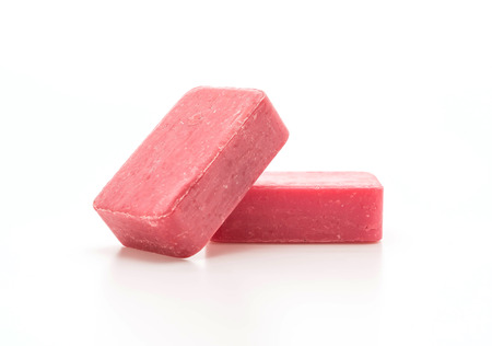 pink soap on white background