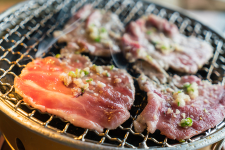 pork on charcoal grill (yakiniku)- korean styleの写真素材