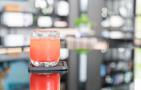 glass of punch juice on tableの写真素材
