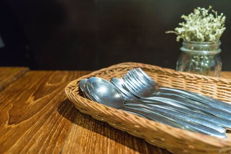 fork and spoon in trayの写真素材