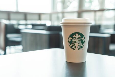 Bangkok ,Thailand-July 6 : Starbucks Hot beverage coffee on table on 6 July 2016 at The mall department store, Bangkok, Thailand.のeditorial素材