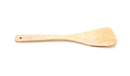 wooden spade of frying pan on white backgroundの写真素材
