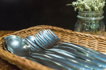 fork and spoon in trayの写真素材