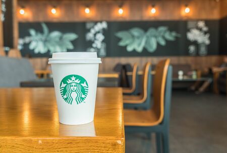 Bangkok ,Thailand-July 6 : Starbucks Hot beverage coffee on table on 6 July 2016 at The mall department store, Bangkok, Thailand.のeditorial素材