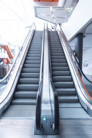 escalator,Up and down escalators in public building.