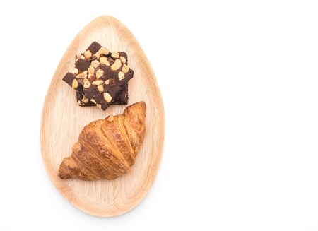 croissant and brownies on white backgroundの写真素材