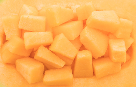 fresh cantaloupe melon for dessert on tableの写真素材