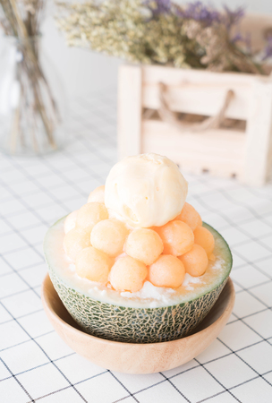 Ice melon Bingsu, famous korean ice-cream on tableの写真素材