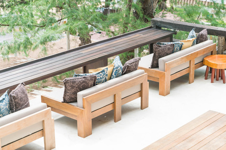 Empty chair and table around outdoor deck