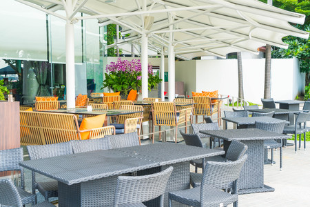 Empty chair and table with outdoor deckの写真素材