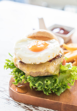cheese pork hamburger with french friesの写真素材