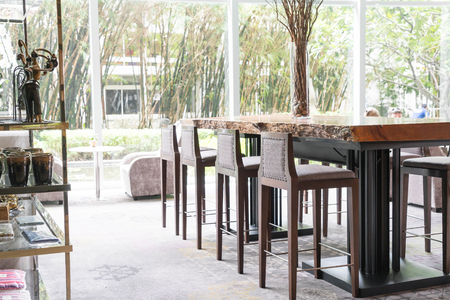 empty dinning room table and chairsの写真素材