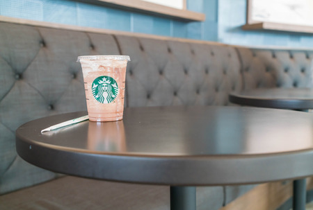 Bangkok Thailand, Jul 10 2016 : Iced chocolate frappuchino on table in Starbuck cafeのeditorial素材