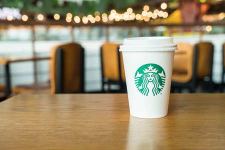 Bangkok ,Thailand-July 6 : Starbucks Hot beverage coffee on table on 6 July 2016 at The mall department store, Bangkok, Thailand.のeditorial素材