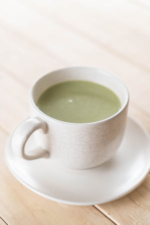 a cup of matcha latte green teaの写真素材