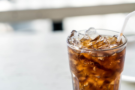 iced cola glass on the tableの写真素材