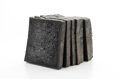 charcoal bread on white backgroundの写真素材