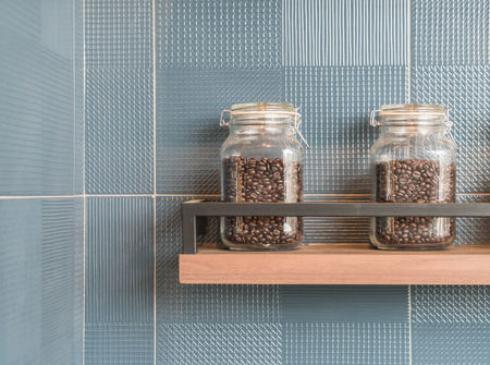 coffee bean in bottle on shelfの写真素材