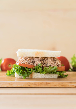 tuna sandwich on wood boardの写真素材