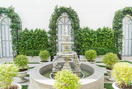 fountain decoration in garden with empty spaceの写真素材