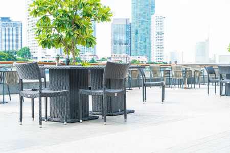 Empty chair and table with outdoor deckの写真素材