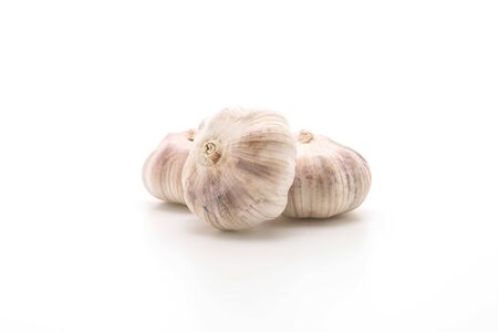 fresh garlic on white backgroundの写真素材