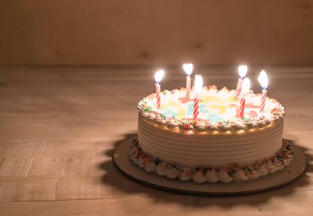 happy birthday cake on tableの写真素材