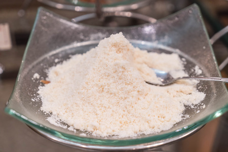 Grated Parmesan Cheese on plateの写真素材