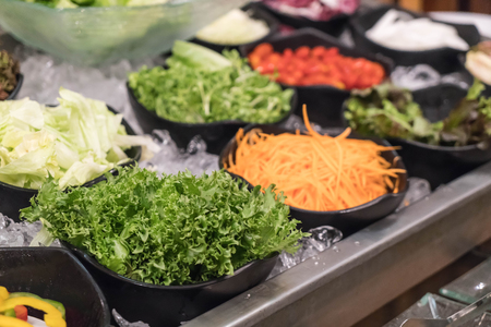 mixed salad bar in restaurantの写真素材