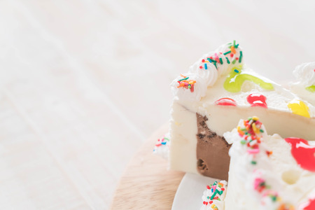 happy birthday ice-cream cake on tableの写真素材