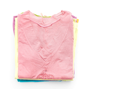 stacks of clothing on white backgroundの写真素材