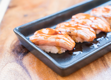 salmon burned sushi with teriyaki sauce - japanese foodの写真素材